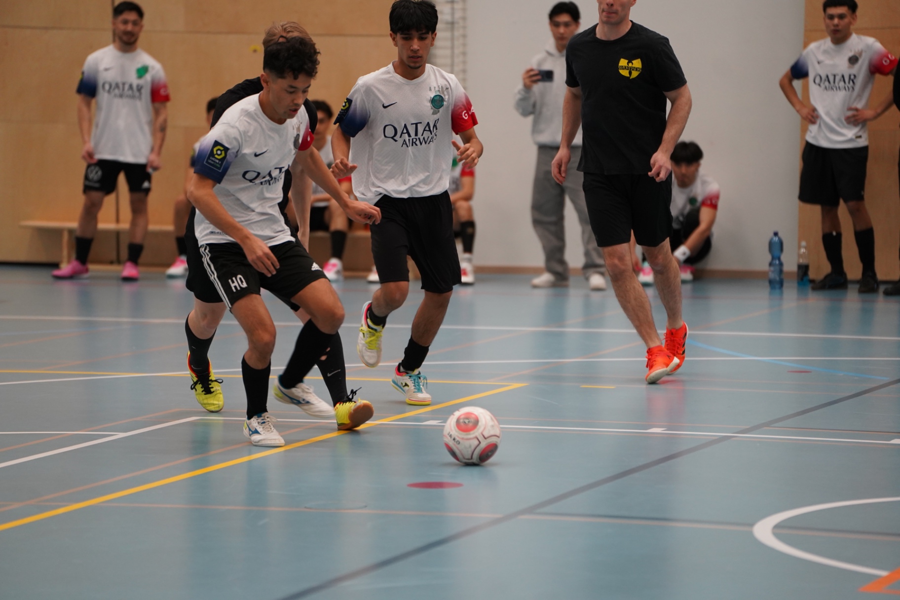Shirdaghian FC player shielding the ball from an opponent