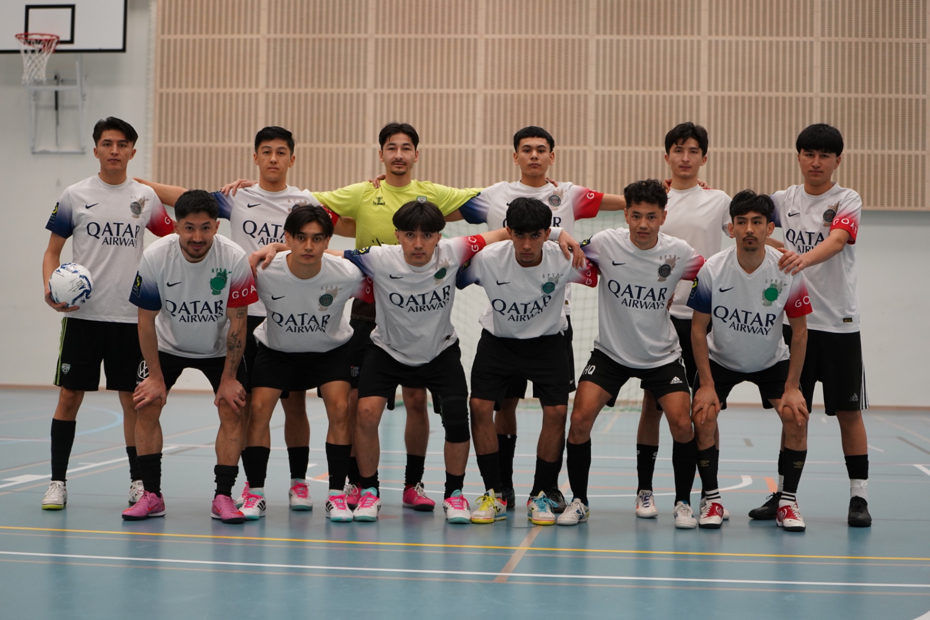 Shirdaghian FC squad lined up in the sports hall before a match