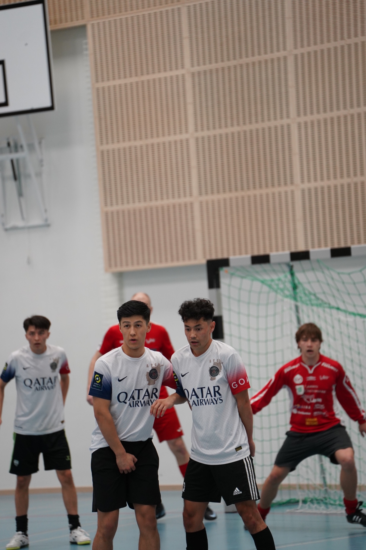 Two Shirdaghian FC players defending in front of the goal